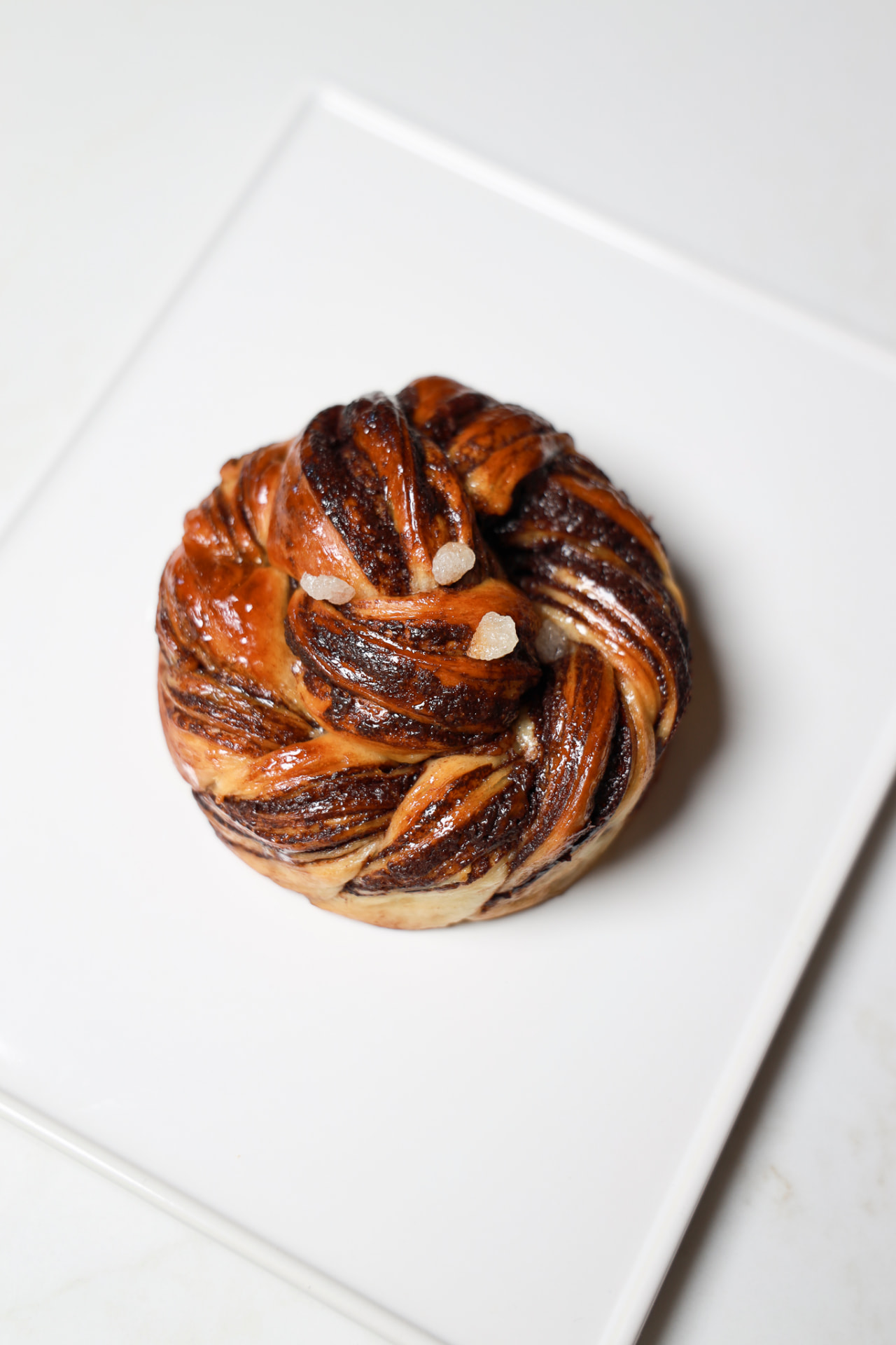 Cocoa Twist pastry on a ceramic plate