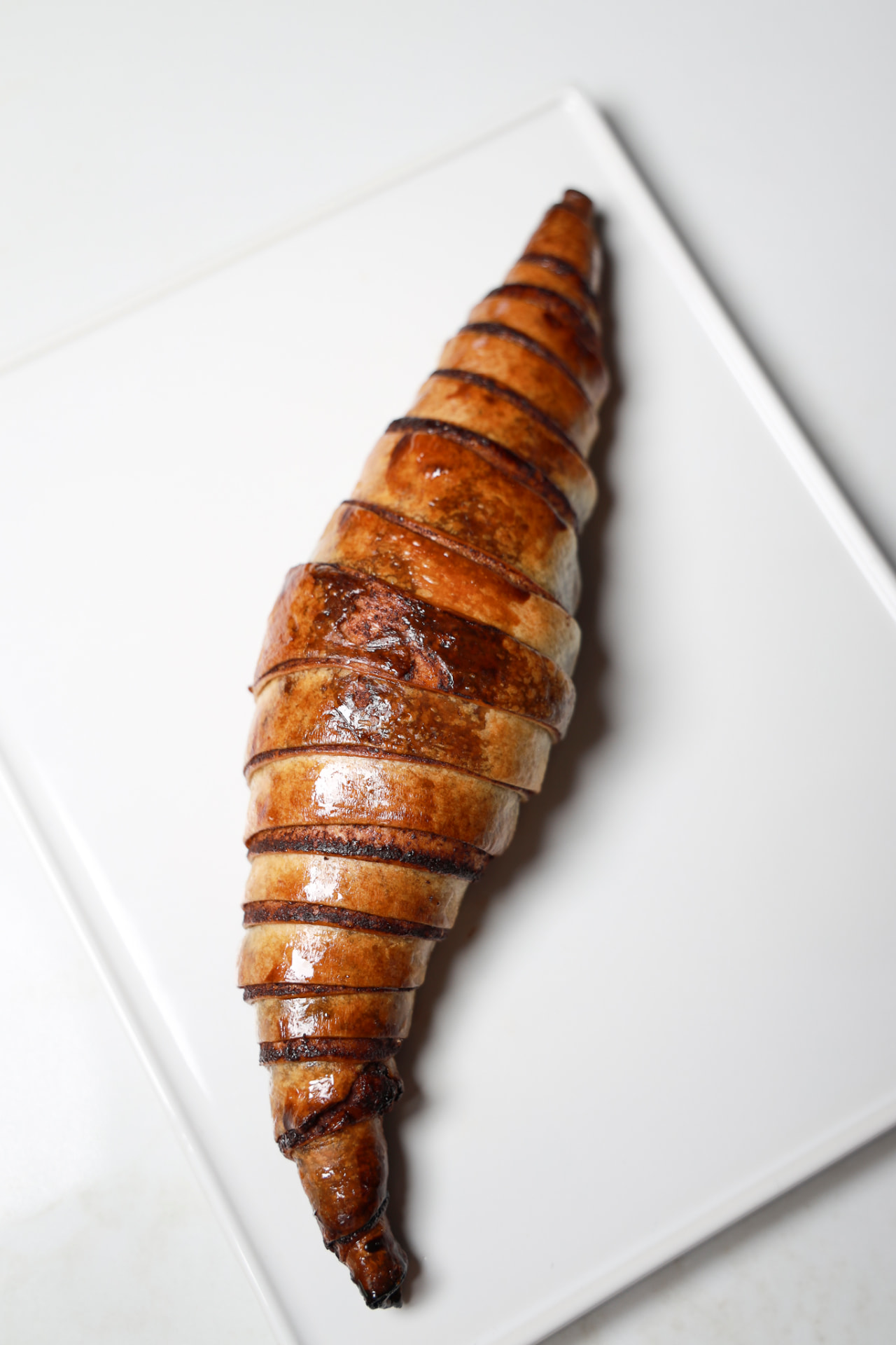 Rugalach pastry on a ceramic plate