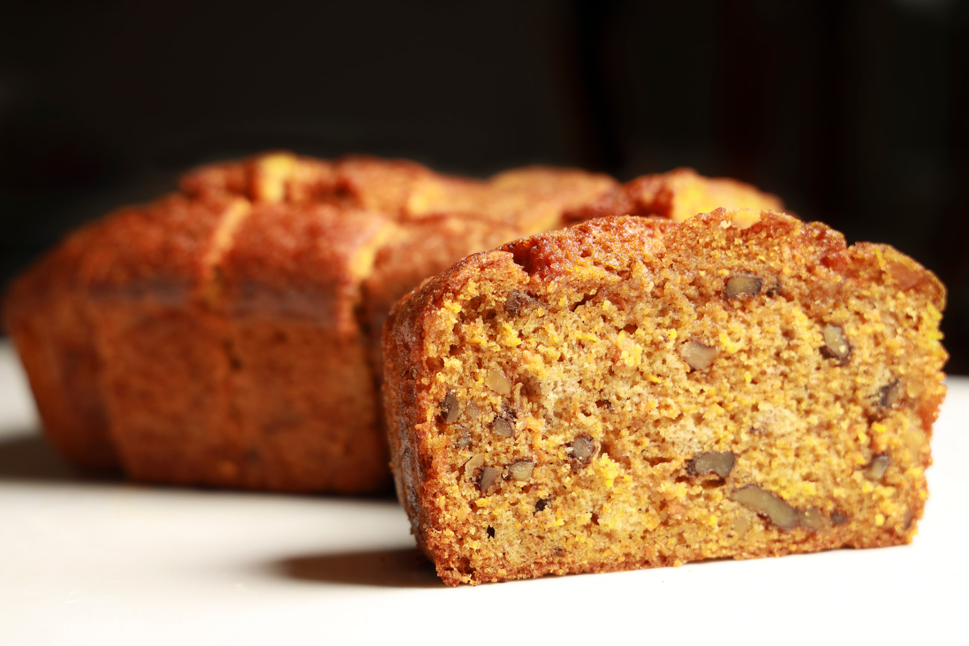 Carrot Walnut Loaf pastry on a ceramic plate